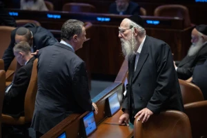 Minister of Defence Israel Katz speaks with MK's during a plenum session at the assembly hall of the Knesset, the Israeli parliament in Jerusalem, October 29, 2025. Photo by Chaim Goldbergl/Flash90