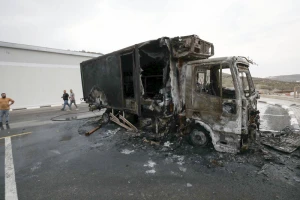 Palestinians inspect burned trucks and cars following an attack by Israeli settlers in the village of Beit Lid, east of Tulkarm, in the West Bank, on November 11, 2025. Photo by Nasser Ishtayeh/Flash90