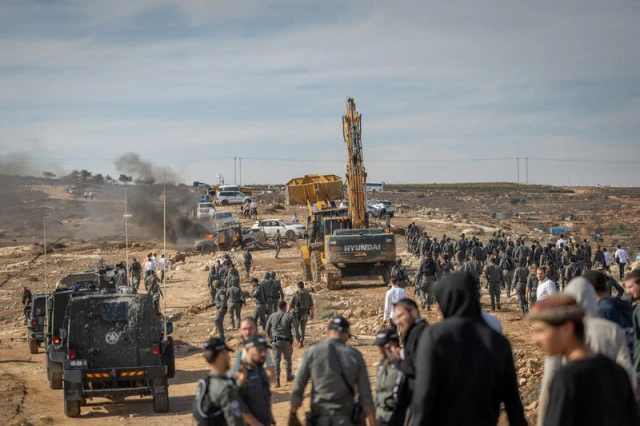 Israeli security forces clash with Jewish settlers during the evacuation of Illegal structures in Tzur Misgavi, an outpost in Gush Etzion, in the West Bank, November 17, 2025. Photo by Chaim Goldberg/Flash90