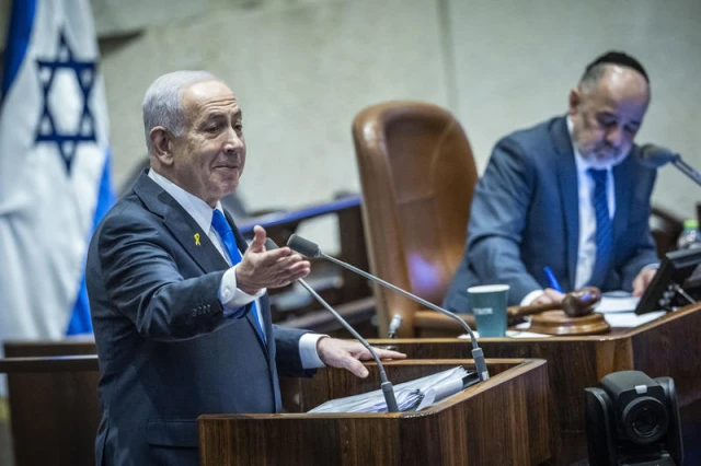 Israeli Prime Minister Benjamin Netanyahu at a 40 signatures debate, at the plenum hall of the Knesset, the Israeli parliament in Jerusalem, on December 8, 2025. Photo by Chaim Goldberg/Flash90