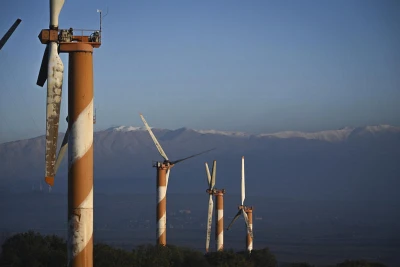 View of station of wind turbines with the first snow this winter on Mount Hermon in Syria, as seen from the northern Golan Heights near the Syrian border, on December 13, 2025. Photo by Michael Giladi/Flash90