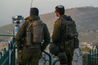 Israeli soldiers observe southern Lebanon from a lookout point near the Israeli border, January 25, 2026. Photo by Ayal Margolin/Flash90