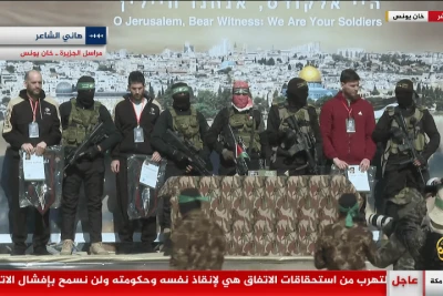 Hamas and PIJ force hostages Alex Trupanov, Yair Horn and Sagui Dekel-Chen to give speeches before their release in Khan Younis, Gaza on Feb. 15, 2025 (Photo used under section 27A of the copyright law).