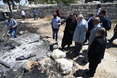US Ambassador to Israel, Mike Huckabee, visiting the site of an alleged arson attack by Jewish settlers on the historic church ruins of St. George in Tabyeh, Samaria, on July 19, 2025. Photo by Ambassador Huckabee on X.