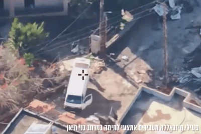 Hezbollah operatives spotted transferring weapons in southern Lebanon, shortly before an airstrike. Photo: IDF Spokesperson's Unit footage.