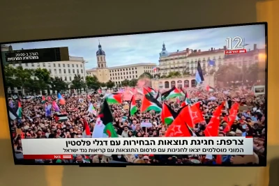 The crowds celebrating the results after the elections in France, July 2024 (Photo: Screenshot from Israeli TV news).