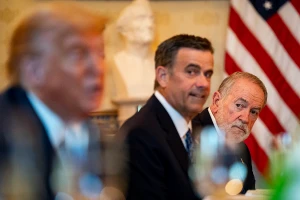 Mike Huckabee, US ambassador to Israel, right, John Ratcliffe, director of the Central Intelligence Agency (CIA), center, during a dinner with US President Donald Trump, left, and Israeli Prime Minister Benjamin Netanyahu, not pictured, in the Blue Room of the White House in Washington, DC, US, on Monday, July 7, 2025. Photographer: Al Drago/Pool/Sipa USA