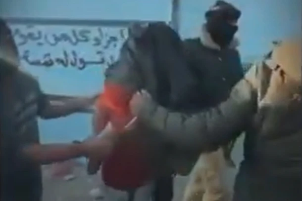 Hamas operatives seen executing Gazan civilians accused of stealing flour amid an ongoing humanitarian crisis. (Screenshot from video footage)