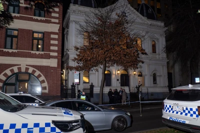 Police officers are seen collecting evidence at the scene. Police declared a crime scene after a suspected arson attempt at East Melbourne Hebrew Congregation. (Photo: Reuters)