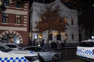 Police officers are seen collecting evidence at the scene. Police declared a crime scene after a suspected arson attempt at East Melbourne Hebrew Congregation. (Photo: Reuters)