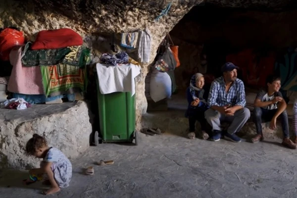 Palestinians living in a cave in southern Hebron Hills (Judea) (Photo: Screenshot).