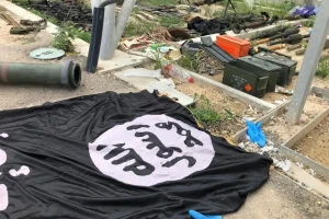 Israeli Defense Forces shared a picture of an ISIS flag left at the scene of an attack by Hamas during the October 7 massacres in Israel at the Gaza envelope (Photo: Twitter/Israel Defense Forces).