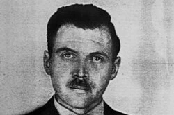 Photograph from Mengele's Argentine identification document, 1956 Photo:  "The last Nazi - The Life and Times of Dr. Josef Mengele" taken by  a police photographer in 1956 in Buenos Aires for Mengele's Argentine identification document