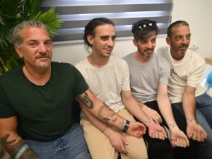 Ariel and David Cunio with their family at the initial reception point, October 13 2025. Photo: Prime Minister's Office