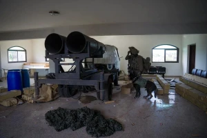IDF soldiers with a truck-mounted Hezbollah rocket launcher found in a civilian home in Lebanon (Photo by IDF).