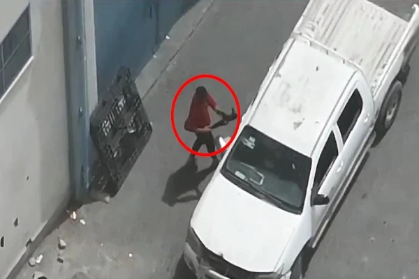 Hamas terrorists armed with guns seen inside a UNRWA logistic center for humanitarian purposes in Gaza, on Saturday May 11, 2024 (Photo: IDF).