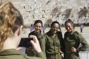 Israeli soldiers seen posing for a picture at the Western Wall, Judaism's holiest site, in Jerusalem's Old City. February 02, 2014. Photo by Nati Shohat/FLASH90