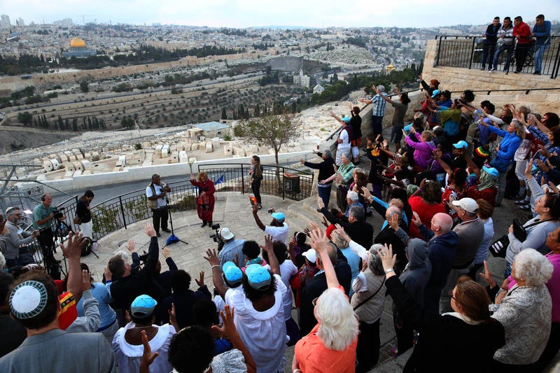 ews and Christians take part in a joint prayer during the 'Bible School on Wheels Sukkot Tour' in Jerusalem, led by Kadesh organization, at the Mount of Olives, October 12, 2014. Kadesh is an organization that seeks to reconnect Christians with the religion's Jewish roots in Israel. Photo by Nati Shohat/Flash90