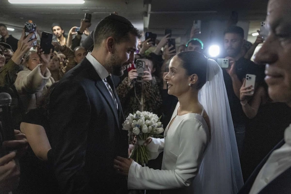Love in a time of sirens: Israeli couple marries in bomb shelter during Iranian missile attacks