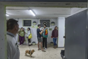 People take cover in a bomb shelter from incoming missiles fired from Iran in Tel Aviv, March 16, 2026. Photo by Chaim Goldberg/Flash90