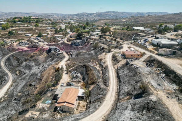 Firefighters battle flames in northern Israel during intense summer heat