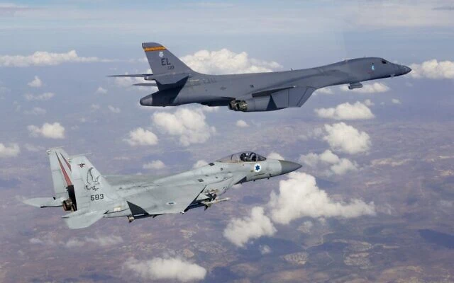 An Israeli F-15 fighter jet escorts an American B-1b heavy bomber through Israeli airspace, on October 30, 2021. (Israel Defense Forces)