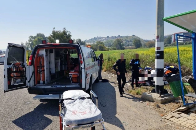 MDA medics and paramedics are providing medical treatment on-site to two injured individuals. Photo: MDA Telegram