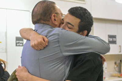 Staff Sgt. Edan Alexander embraces a family member during an emotional reunion at Tel Aviv Sourasky Medical Center, Israel, May 12, 2025.
Photo: GPO