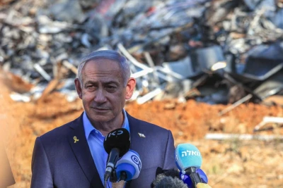 Israeli Prime Minister Benjamin Netanyahu visits at the scene where a ballistic missile fired from Iran hit and caused damage at the Weizmann Institute in Rehovot, June 20, 2025.