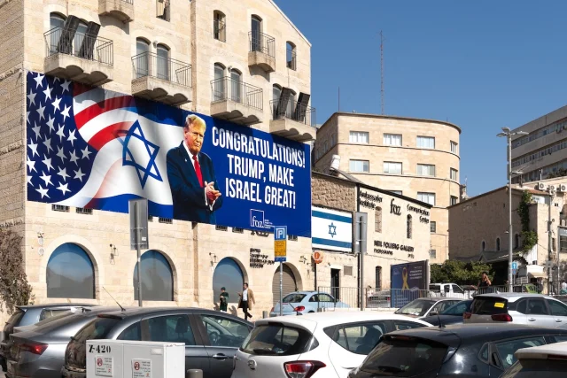 Banner with photo of Donald Trump congratulating on his victory in the US presidential election hangs on a building in Jerusalem, November 8, 2024. (Photo: Shutterstock)