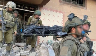 IDF soldiers carry the body of Hamas leader Yahya Sinwar after killed in a firefight in Gaza, October 17, 2024 (Social media - used by section 27A of the copyright law)