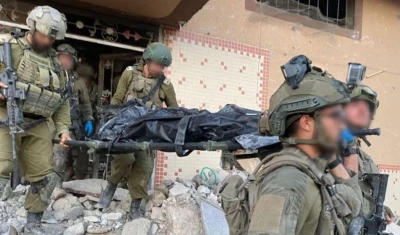 IDF soldiers carry the body of Hamas leader Yahya Sinwar after killed in a firefight in Gaza, October 17, 2024 (Social media - used by section 27A of the copyright law)