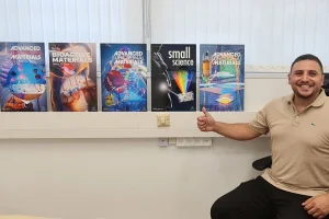 Dr. Shady Farah, assistant professor at the Technion – Israel Institute of Technology’s Faculty of Chemical Engineering, receives a metal print gift highlighting his lab’s pioneering research on smart, multi-purpose medical materials and breakthrough therapeutic technologies. The featured images were selected as covers of leading scientific journals in recognition of his team’s significance and impact. (Photo: His LinkedIn)