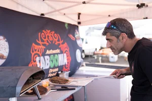 Raif Rashed prepares Druze food at the New Meadowlands Market at MetLife Stadium, East Rutherford, NJ, USA, on October 5, 2024. Photo: Reuters.