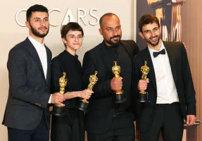 Basel Adra, Rachel Szor, Hamdan Ballal and Yuval Abraham pose with the Oscar for Best Documentary Feature Film for "No Other Land" in the Oscars photo room at the 97th Academy Awards in Hollywood, Los Angeles, California, U.S., March 2, 2025. REUTERS/Daniel Cole