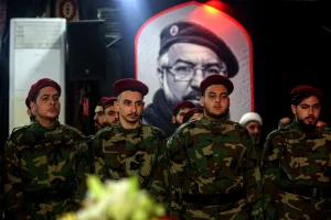 April 2, 2025, Beirut, Beirut, Lebanon: Pro-Iranian Hezbollah militants attend the funeral procession of party leader Hassan Bdier and his son Ali, who were killed in an Israeli attack. Photo: Reuters