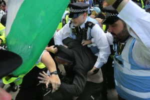 British Police arrest a protester during a pro-Palestine Action rally in London, June 23, 2025. (Credit: Martin Pope/ZUMA Press Wire)
