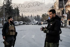 Syrian government soldiers are deployed near the Sheikh Maqsoud and Ashrafieh neighborhoods of Aleppo, following renewed clashes between Kurdish forces and government troops. The Syrian interim government in Damascus announced Wednesday a "limited military operation" against areas controlled by the Kurds in the northern city of Aleppo, and declared the two neighborhoods as "militarily restricted zones". January 7, 2025 Photo: Reuters Connect