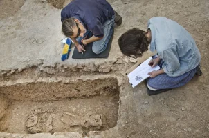 The exposed nun is wrapped with chains. Photo: Israel Antiquities Authority's Facebook page.