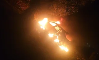 The vehicle that was likely used by the shooting suspects. Photo: Israel Fire and Rescue Services