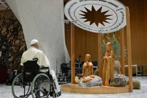 Pope Francis visits a Palestinian nativity scene in the Vatican that depicts a baby Jesus adorned in a keffiyeh (Photo: Vatican Media)
