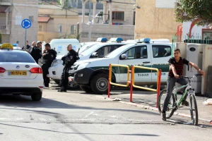 Israeli police seen at the site where a large fight between local Muslim and Druze residents at the Abu Snan village in Northern Israel, November 15, 2014. A scuffle broke out between Arab and Druze residents after a couple of Arab students in a mixed school showed up wearing Kaffiyahs as a sign of protest against the treatment of Arab citizens in Israel. Druze students objected to the gesture and the youth broke into a fight which later spread to other locations in the village, ending up with 41 people injured. Photo by Flash90
