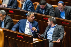 MK Orit Struk with Religious Zionist party head MK Bezalel Smotrich with Head of the Otzma Yehudit party MK Itamar Ben Gvir at a vote in the assembly hall of the Knesset, the Israeli parliament in Jerusalem, on December 28, 2022. Photo by Olivier Fitoussi/Flash90