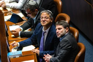 MK Orit Struk with Religious Zionist party head MK Bezalel Smotrich with Head of the Otzma Yehudit party MK Itamar Ben Gvir at a vote in the assembly hall of the Knesset, the Israeli parliament in Jerusalem, on December 28, 2022. Photo by Olivier Fitoussi/Flash90