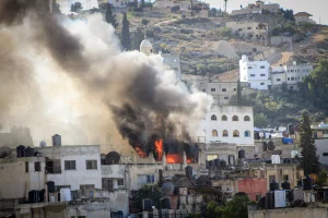 Archive photo: Smoke rises during a counter-terrorism raid by the Israeli army in the West Bank city of Jenin. Photo by Nasser Ishtayeh/Flash90.