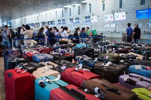Travellers at Ben Gurion International Airport where flights were being delayed, as the workers of the airport went on strike, in a protest for the release of Israelis held hostage by Hamas terrorists in Gaza, on September 2, 2024. Photo by Avshalom Sassoni/Flash90