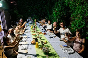 A Jewish family celebrates together on the eve of Rosh Hashana, the Jewish New Year, on October 2, 2024, in Rananna. Photo by Nati Shohat/Flash90