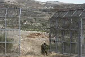 Israeli soldiers seen on the border fence with Syria, in northern Israel, December 11, 2024. Photo by Michael Giladi/Flash90