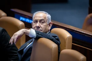 Israeli prime minister Benjamin Netanyahu addresses the Israeli Parliament in Jerusalem, on December 23, 2024. Photo by Chaim Goldberg/Flash90