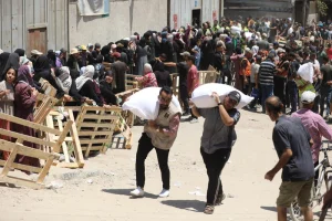 Humanitarian aid is distributed to Palestinians in Gaza City, July 12, 2025. Photo by Ali Hassan/Flash90